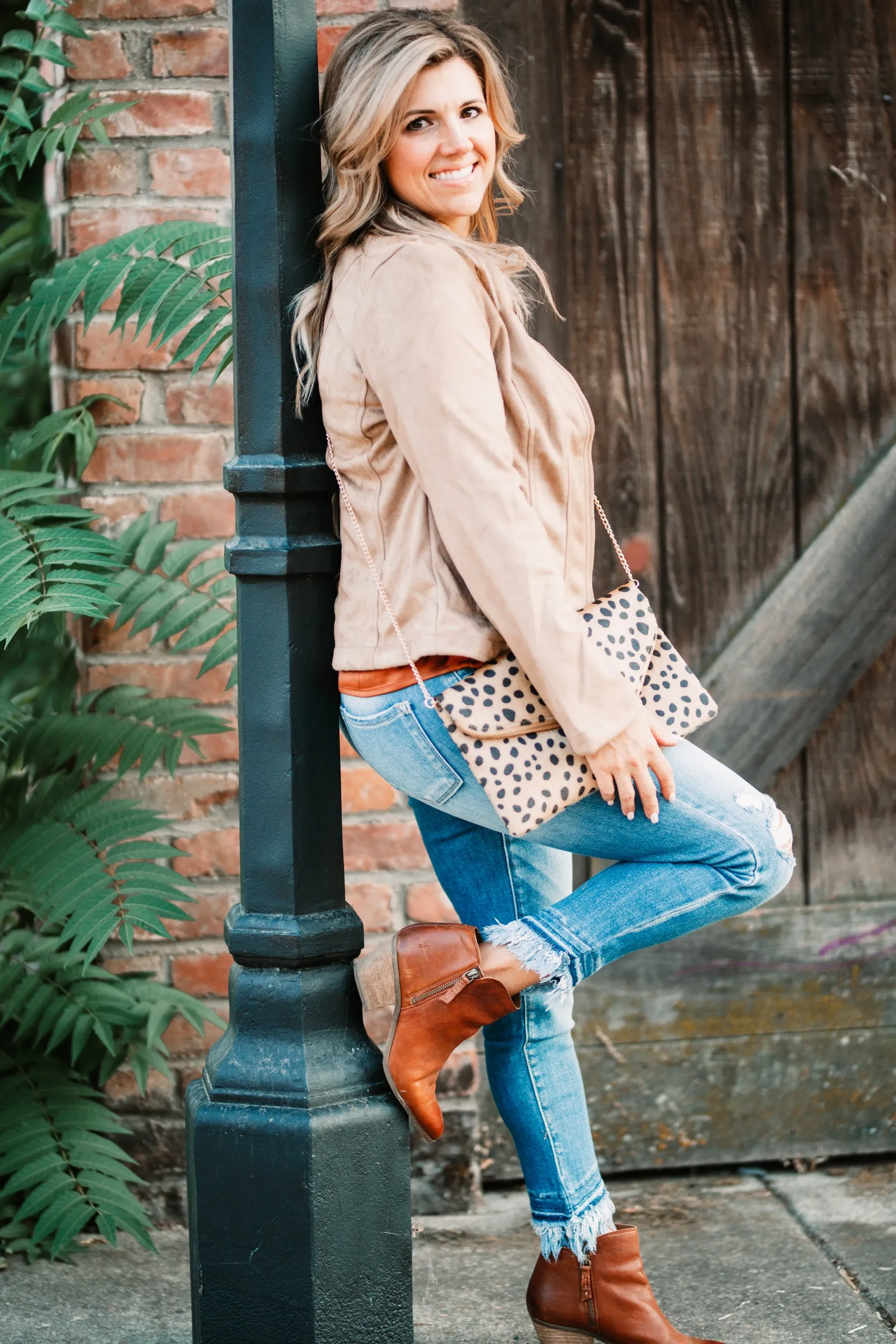 Asymmetrical Frayed Hem Medium Wash Jeans