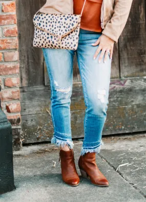 Asymmetrical Frayed Hem Medium Wash Jeans