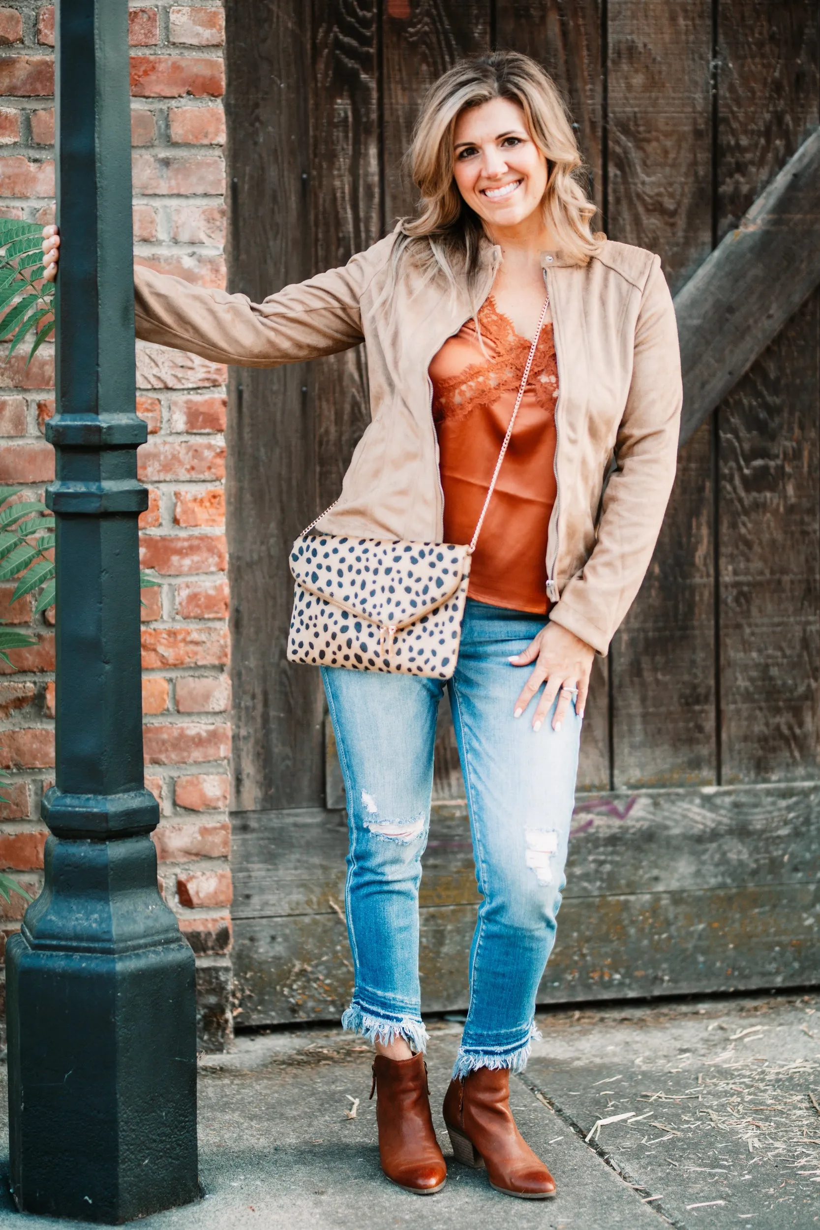Asymmetrical Frayed Hem Medium Wash Jeans