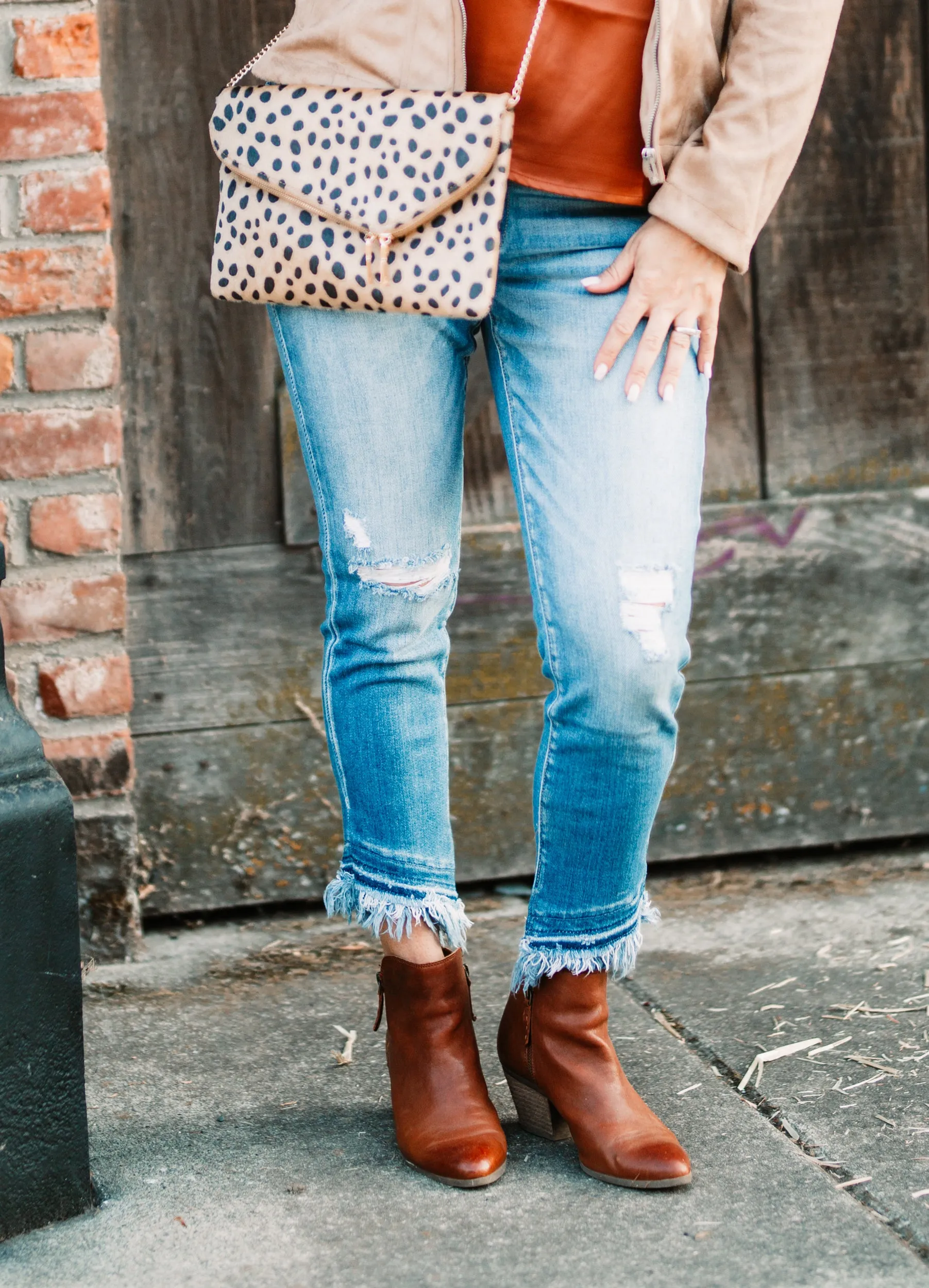 Asymmetrical Frayed Hem Medium Wash Jeans
